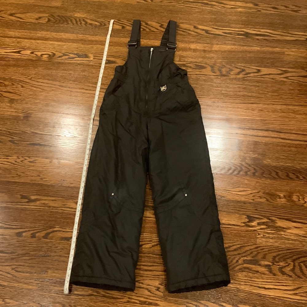 Boys snow jumpsuit. Tapered leg to minimize snow exposure